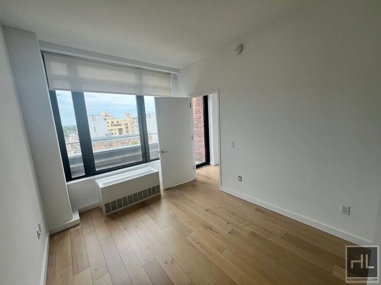 Building Photo - Northern Blvd | Flushing | 2BR/1BA w/Private Terrace, W/D & NO Broker's Fees!