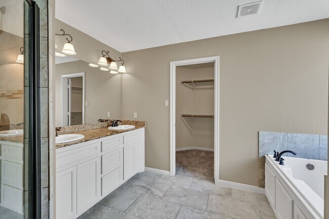 Building Photo - One story, and a 3-car garage!