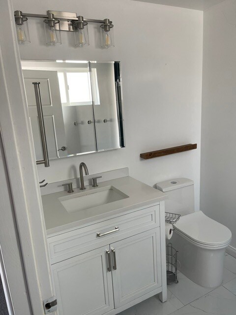 Primary in-suite bathroom - 1029 S Hobart Blvd
