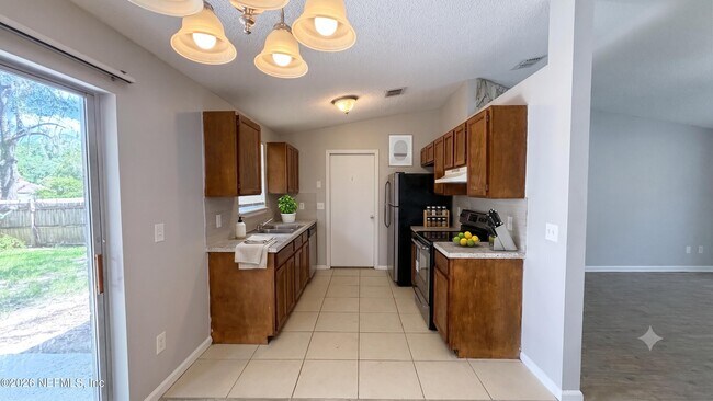 Building Photo - 4711 Cinnamon Fern Dr