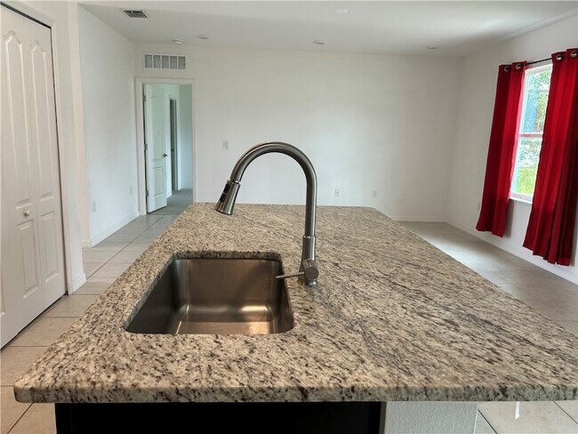 Building Photo - 8046 104th Ct
