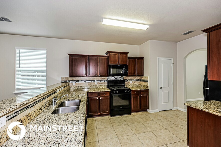 Building Photo - 9425 Bald Cypress St