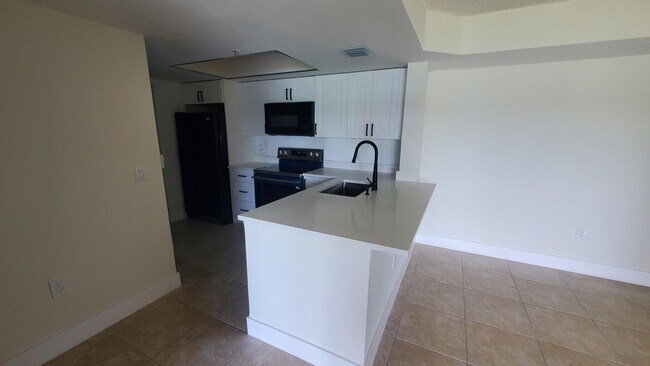 Building Photo - 5011 Wiles Rd