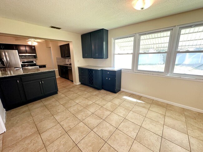 Building Photo - Limited-Time Offer: $500 Off Your First Month. Large Pool Home w/ Huge Yard, New Kitchen - Easy a...