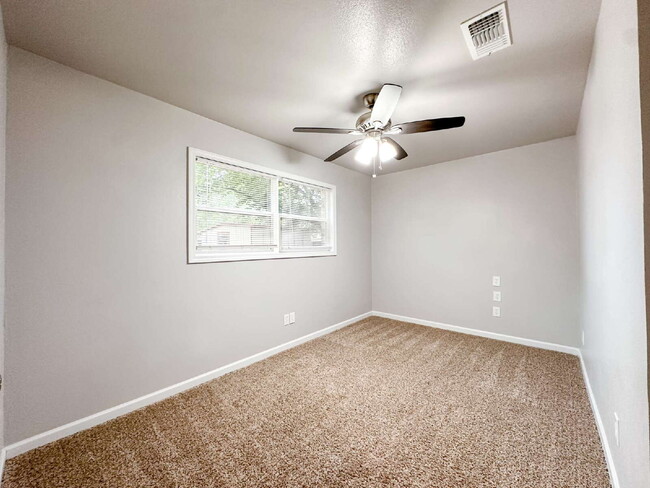 Building Photo - Spacious Living & Modern Upgrades