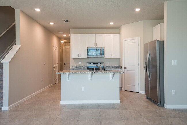 Building Photo - 3944 SE Caladium Ct