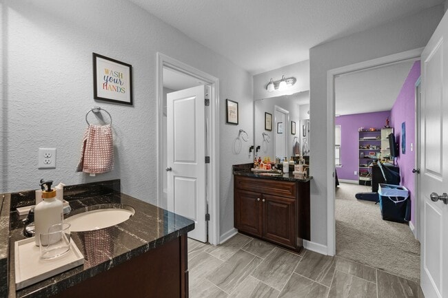 Building Photo - Spacious 6-Bedroom Home with Private Backy...