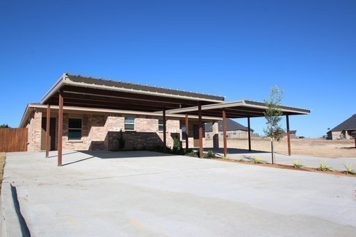 Building Photo - No Water Bill. No Lawn Care. Just Move In. | 3BD/2BA Duplex in Weatherford TX | Ready Now — Act F...