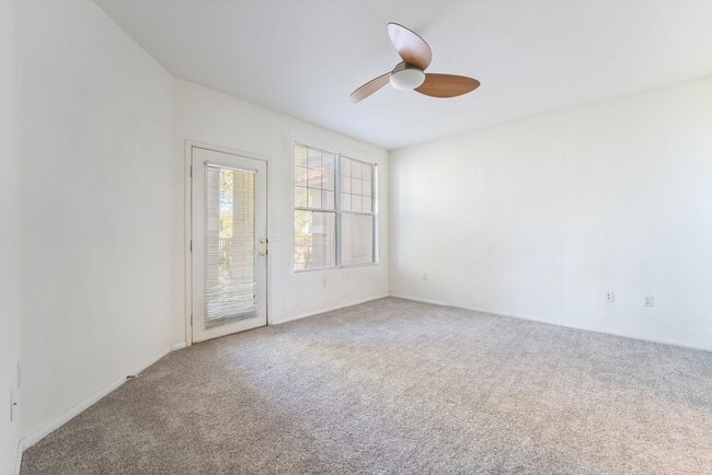 Building Photo - Spacious 3-Bedroom Condo with Garage and Two Private Patios!