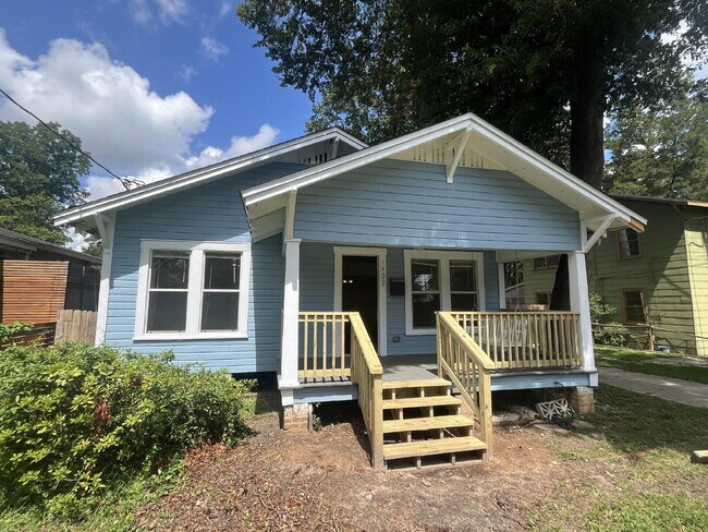 Building Photo - "Charming MIDTOWN 2-Bedroom Home with Glea...