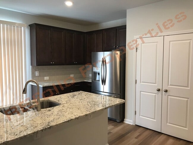 Building Photo - Beautiful 3 Story 4 Bedrooms 2 Car Garage ...