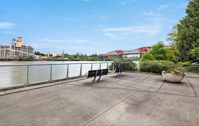 Building Photo - Exquisite Condominium at the Renowned Waterfront Pearl with Views of the River, Work Out Facility...