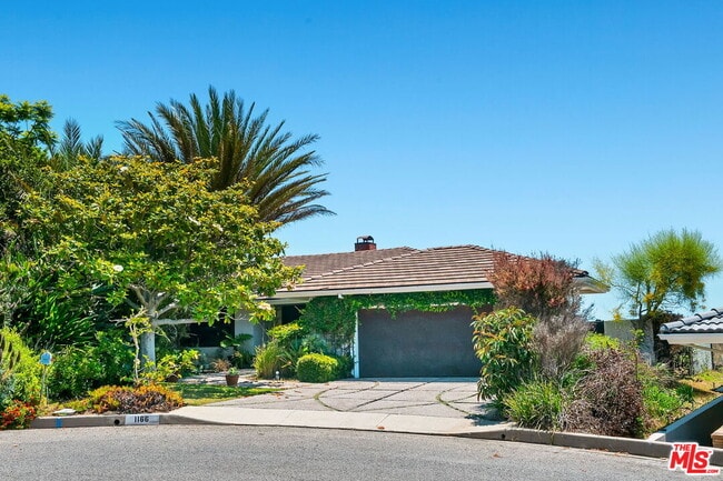 Building Photo - 1166 Las Pulgas Pl