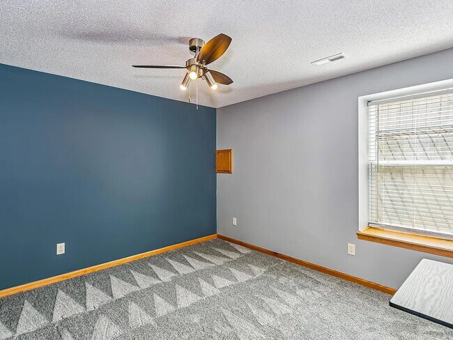 Building Photo - "Spacious 4-Bedroom Family Home with Cozy Fireplace in Wichita - 2261 Sq Ft of Comfort!"