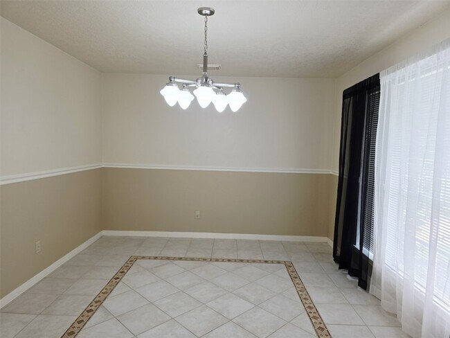 Building Photo - 10306 Jockey Club Dr