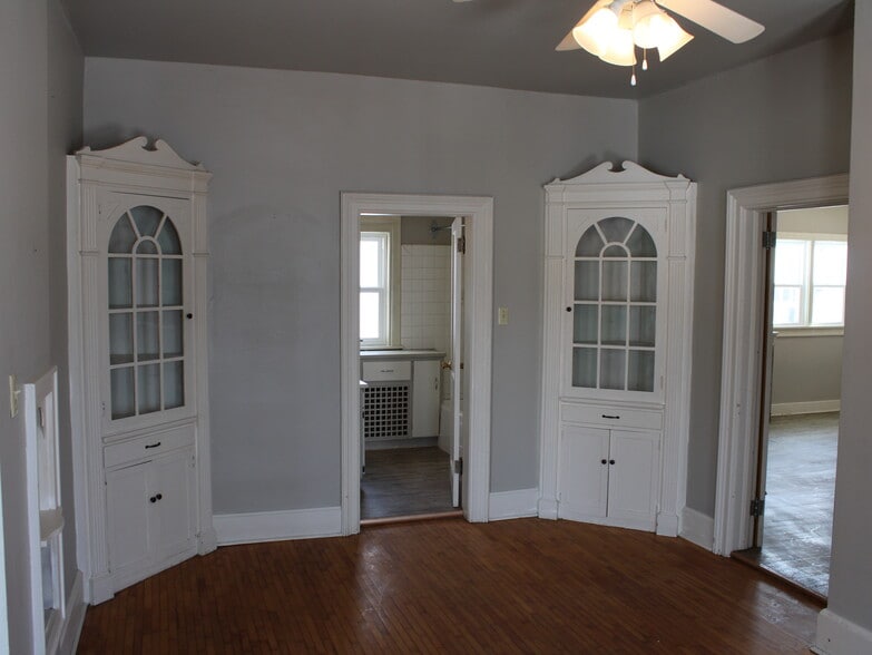 Spacious dining room with beautiful hardwood floor. - 28 5th St
