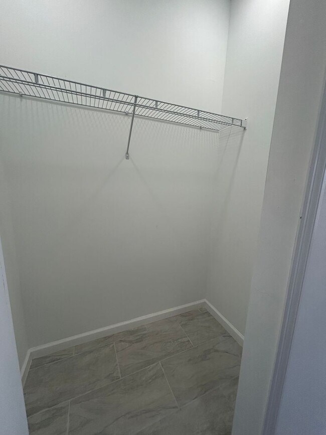 Building Photo - BRAND NEW Modern 4BR/2BA Home with Garage – Peaceful Lake Placid Retreat