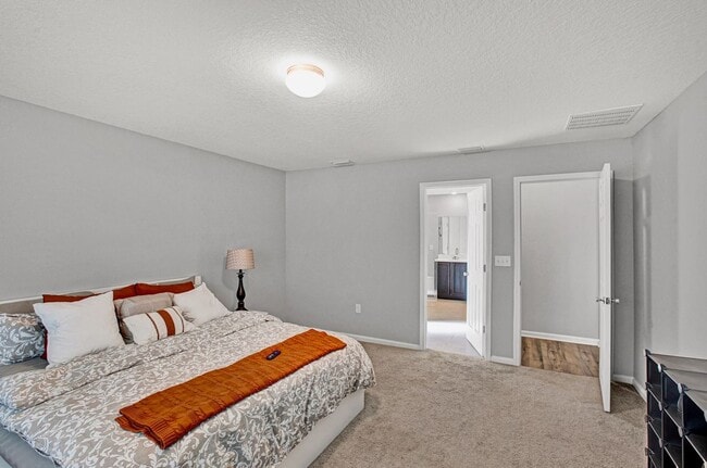 Building Photo - Move-In Ready 4BR Home. Split Floor Plan. 2-Car Garage & Pet Friendly!