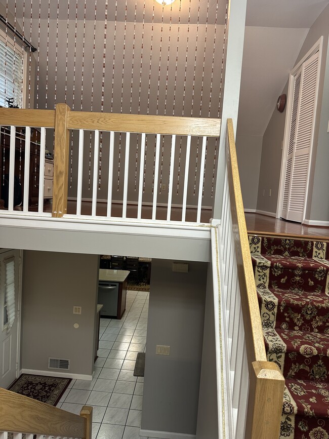 staircase to loft n bedrooms - 62 Brittany Cir