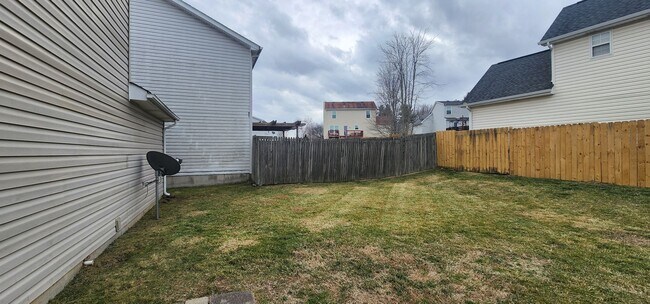 Building Photo - Fantastic 3 Bedrooms & 1.5 Bathroom, Two Story with a Garage!  Freshened Paint throughout!  Newer...