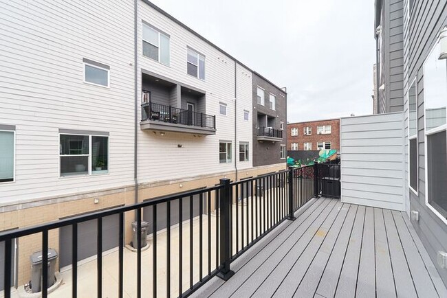 Building Photo - Like New Townhome With Your Own Rooftop Views of Downtown Indy!