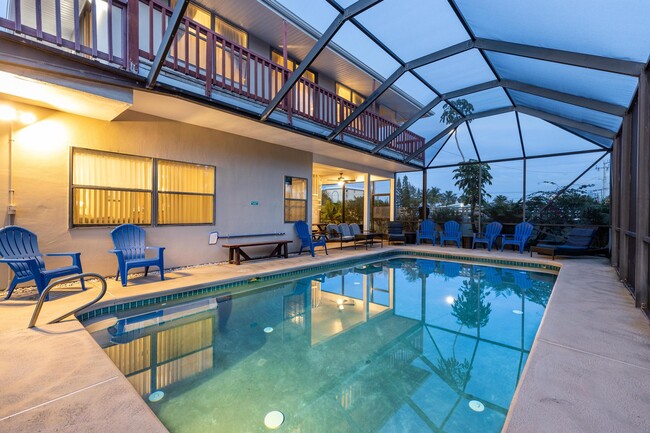 Heated pool in screened pool house - 115 Park Ave