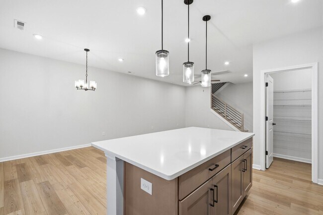 Building Photo - Like-New LoSo Townhome | 3BR + Loft | 2-Car Garage | Move-In Ready