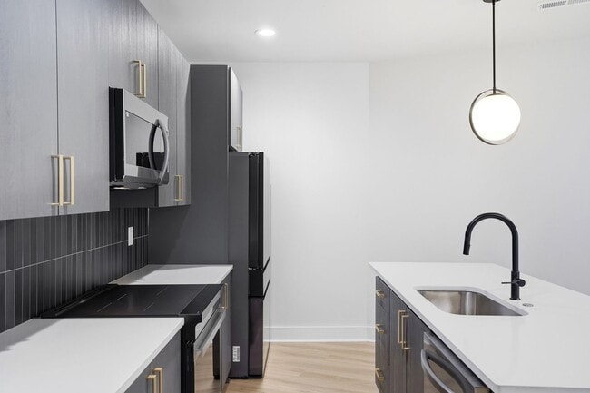 Building Photo - Bright, Open & Exceptionally Large—Your Ideal 2-Story Townhome