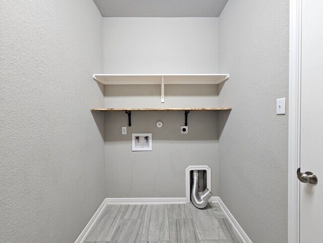 Building Photo - NEW IN MANAGEMENT - AVAILABLE NOW!