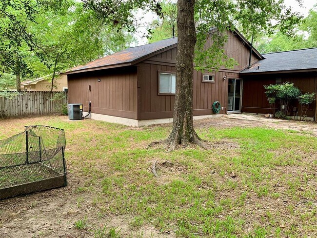 Building Photo - 22 N Wavy Oak Cir