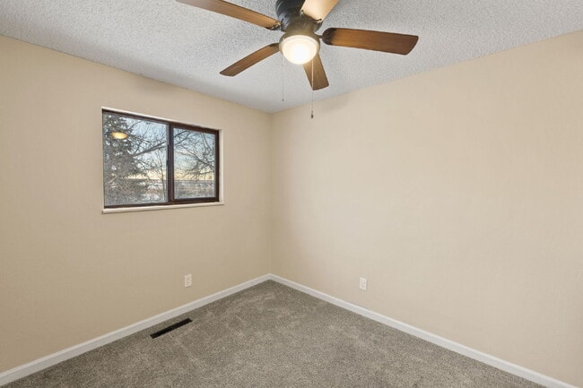 Building Photo - Spacious Split-Level Home with Finished Basement, Deck, Fenced Yard & 2-Car Garage