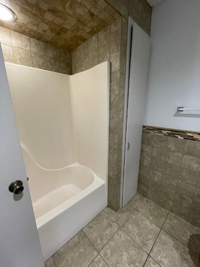 Building Photo - 1 bedroom, 1 bathroom lower level unit with River views.