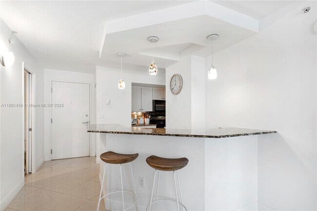 Building Photo - 6917 Collins Ave