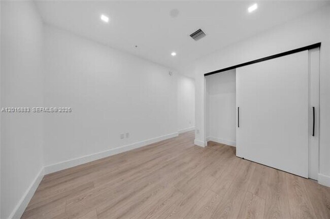 Building Photo - 7901 Hispanola Ave