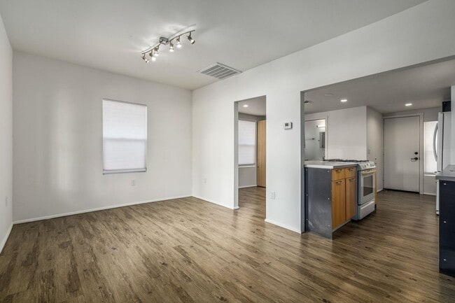 Building Photo - Garfield District 2 Bedroom Townhome | Patio & In-Unit Laundry | Free Rent