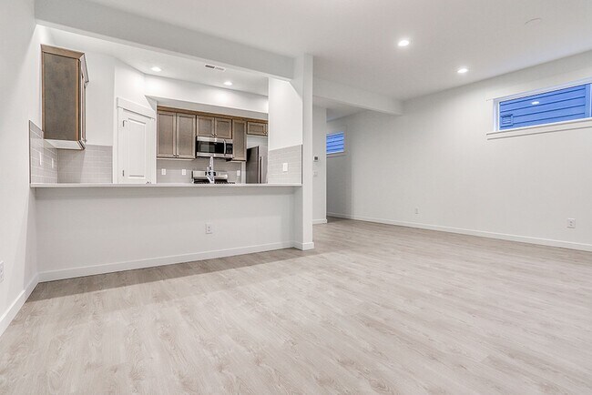 Building Photo - Modern Living in the Heart of Ridgefield: Quartz Finishes & Open-Concept Charm