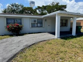 Building Photo - Single Family Home in Mangonia Park w/ Lar...