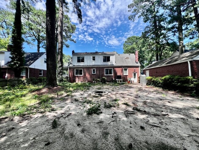 Building Photo - Charming Brick Cape Cope