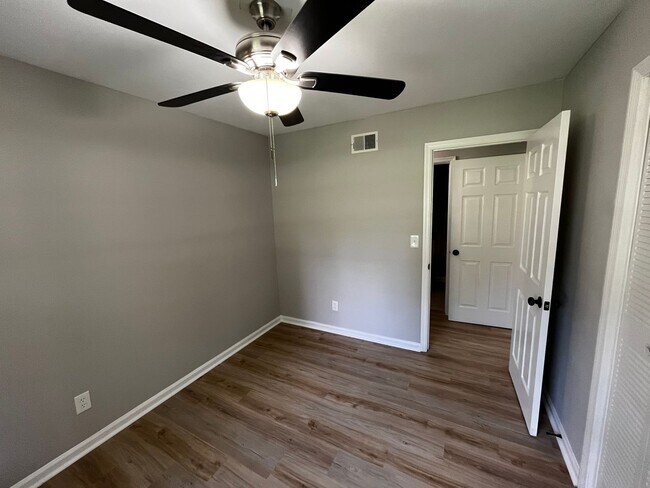 Building Photo - Must See the Sunroom off the Primary Bedroom!