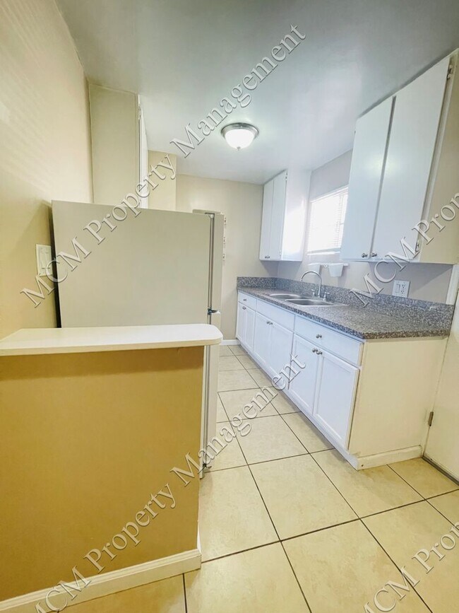 Building Photo - 489-6621 Whitsett Ave