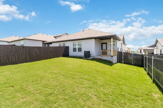 Building Photo - Never-Lived-In 3/2 Unit Featuring Open Living & Spacious Private Yard