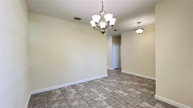 Building Photo - 7755 Purple Finch St