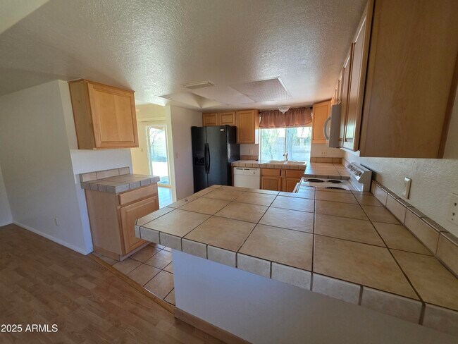 Building Photo - 6037 W Zoe Ella Way