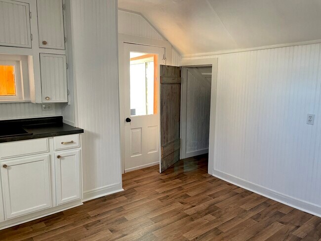 entrance to second story apartment. Door leads to ample clean and dry attic storage. - 432 Webster St
