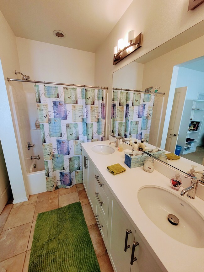 Secondary Bathroom with dual counter-height vanities - 5552 Coral Dr