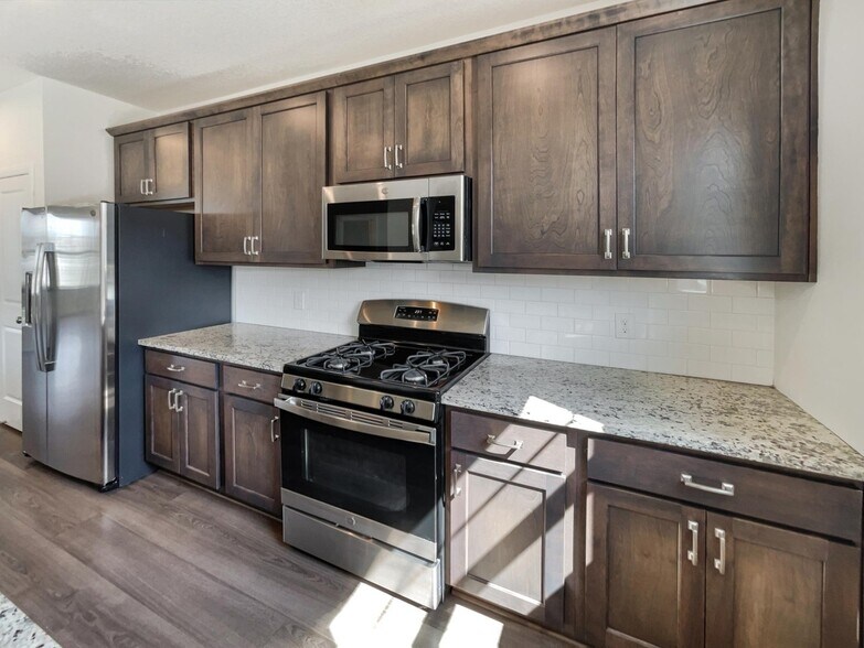 Building Photo - 6964 Huckleberry Dr