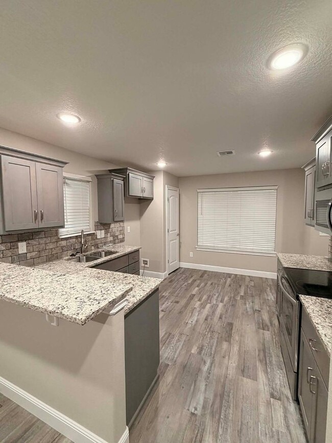 Building Photo - New build, 3 bed/2 bath, stainless steel appliances, two car garage, fenced in back yard!!!!