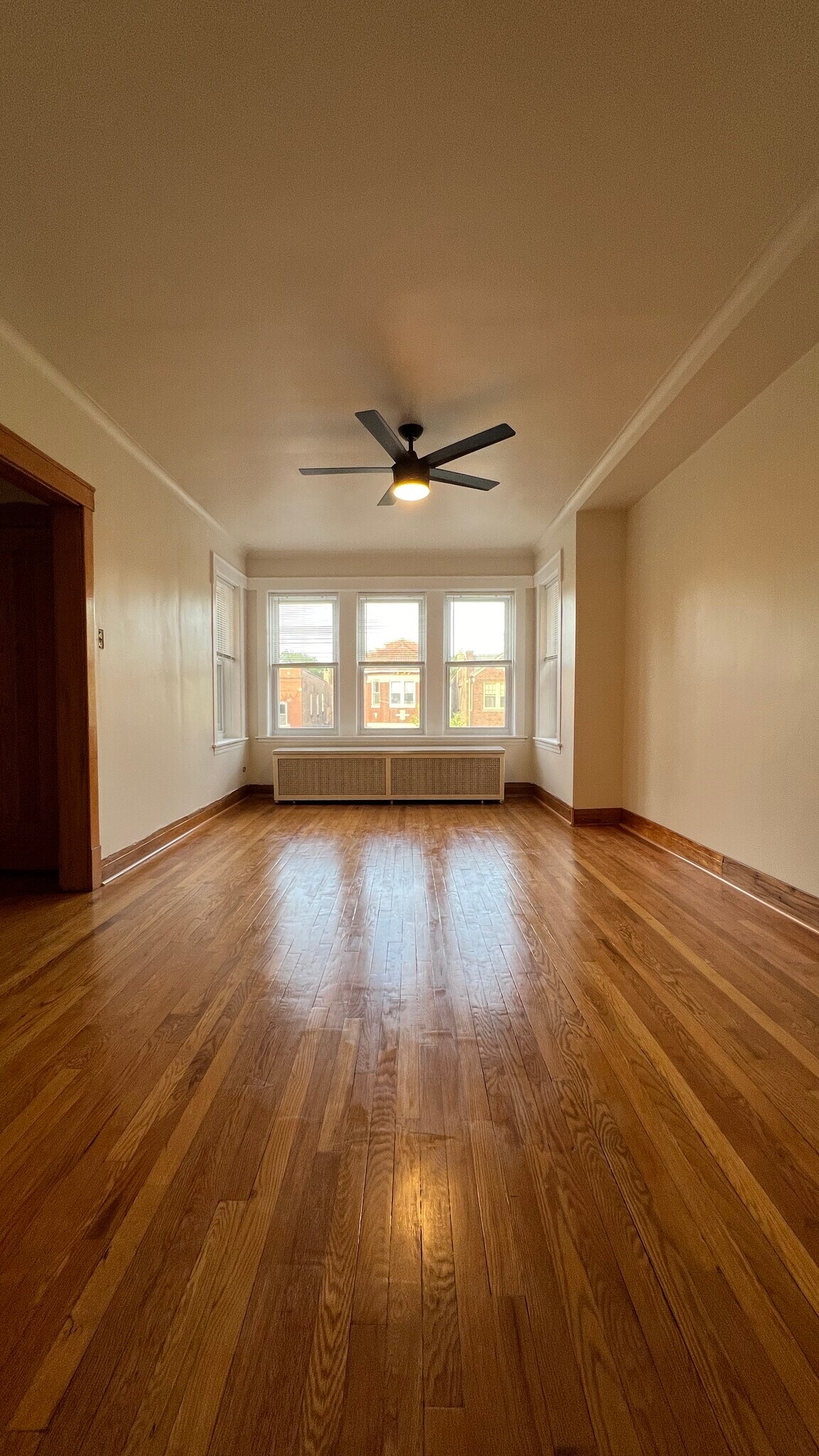 Living room with fan - 3354 N Springfield Ave