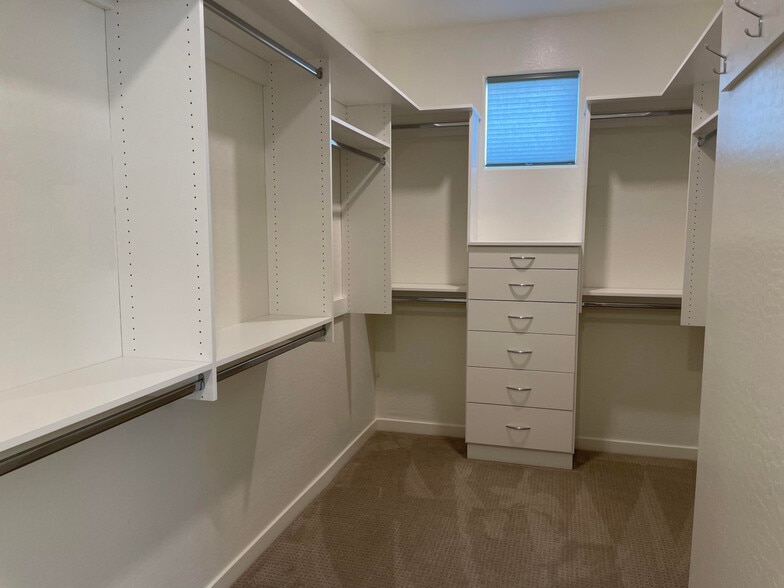 3rd Floor, Master Closet with Built-in Storage - 300 N Gila Springs Blvd