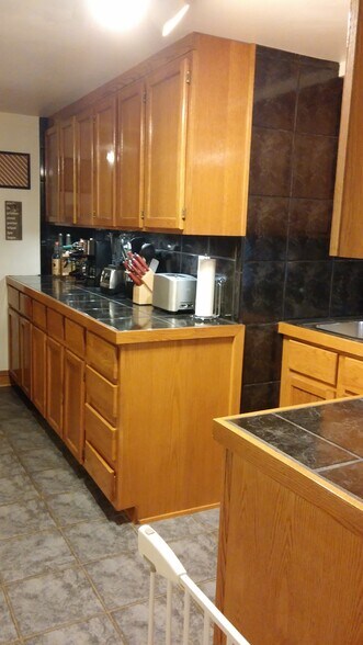 Building Photo - 5009 N Mango Ave